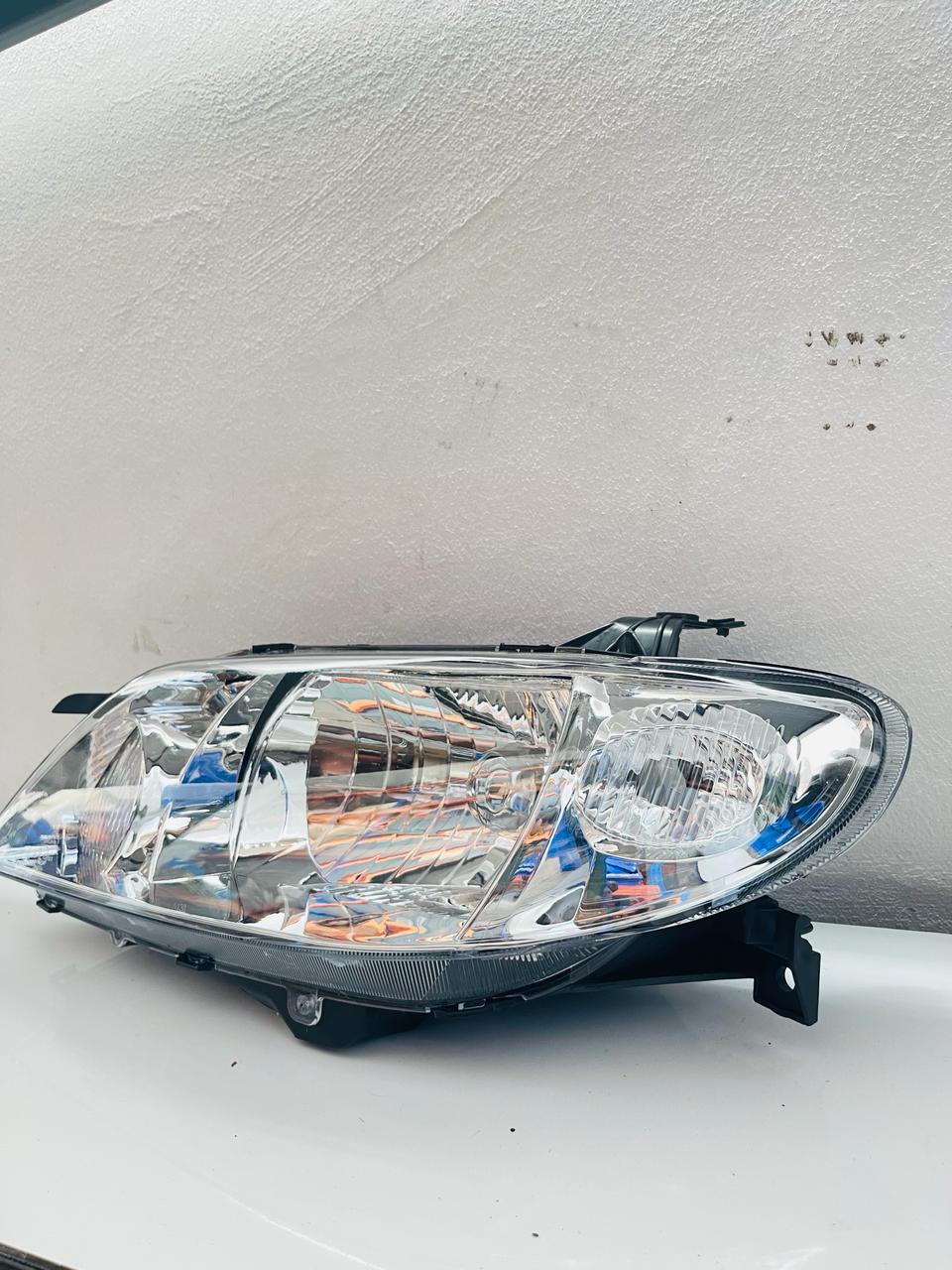 MAZDA 323 Headlamp Yr 2000-2003
