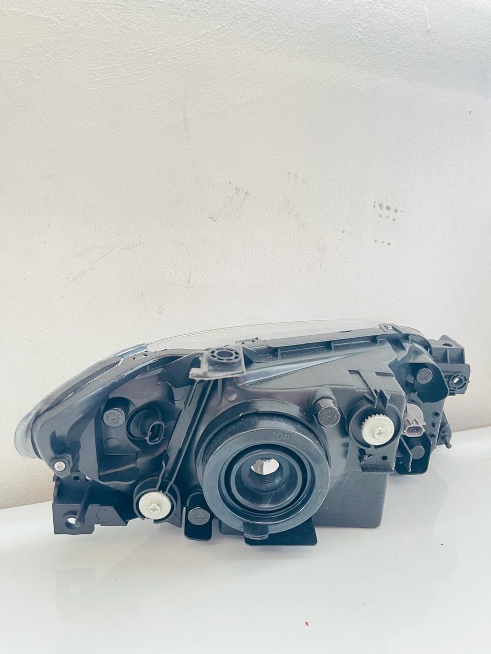 MAZDA 323 Headlamp Yr 2000-2003