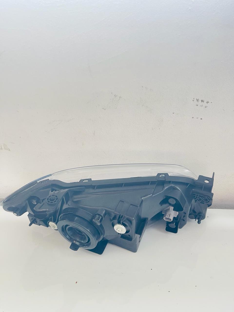 MAZDA 323 Headlamp Yr 2000-2003